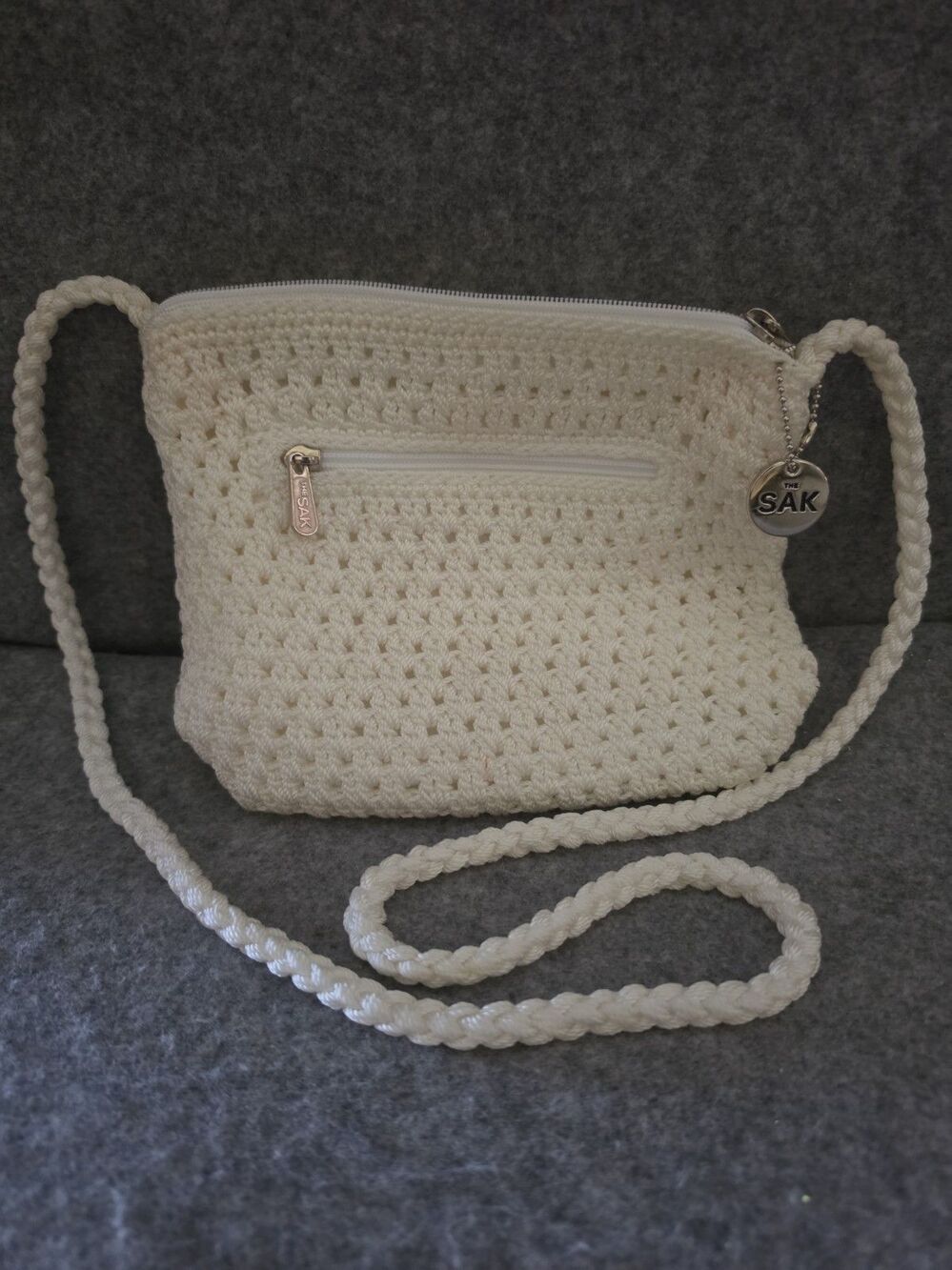 The Sak Ivory Shoulder Bag Zip Closure Bag Charm Lined Inner Pockets